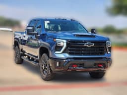 Chevrolet Silverado 2500HD LT 4WD Crew Cab 159" 2026 — side view
