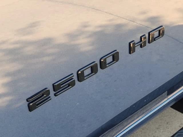 Chevrolet Silverado 2500HD LT 4WD Crew Cab 159" 2026 — side view