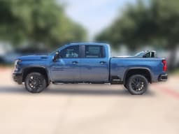 Chevrolet Silverado 2500HD LT 4WD Crew Cab 159" 2026 — side view