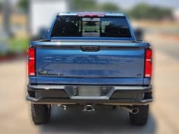 Chevrolet Silverado 2500HD LT 4WD Crew Cab 159" 2026 — side view