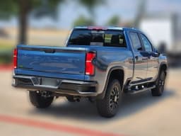 Chevrolet Silverado 2500HD LT 4WD Crew Cab 159" 2026 — side view