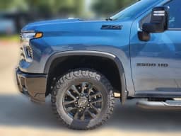 Chevrolet Silverado 2500HD LT 4WD Crew Cab 159" 2026 — side view