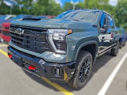 Chevrolet Silverado 2500HD LT 4WD Crew Cab 159" 2026 — side view