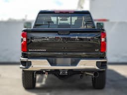 Chevrolet Silverado 2500HD LT 4WD Crew Cab 159" 2026 — side view