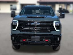 Chevrolet Silverado 2500HD LT 4WD Crew Cab 159" 2026 — side view