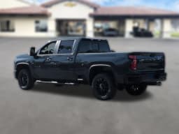 Chevrolet Silverado 2500HD LT 4WD Crew Cab 159" 2026 — side view