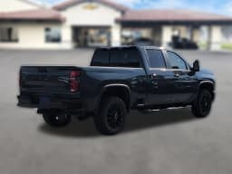Chevrolet Silverado 2500HD LT 4WD Crew Cab 159" 2026 — side view