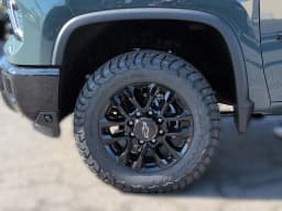 Chevrolet Silverado 2500HD LT 4WD Crew Cab 159" 2026 — side view
