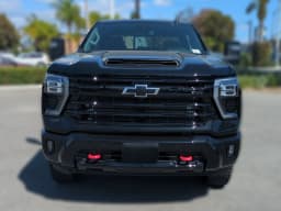 Chevrolet Silverado 2500HD LT 4WD Crew Cab 159" 2026 — side view