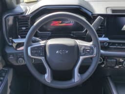 Chevrolet Silverado 2500HD LT 4WD Crew Cab 159" 2026 — side view