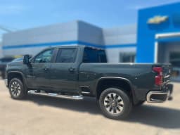 Chevrolet Silverado 2500HD LT 4WD Crew Cab 159" 2026 — side view