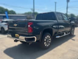 Chevrolet Silverado 2500HD LT 4WD Crew Cab 159" 2026 — side view