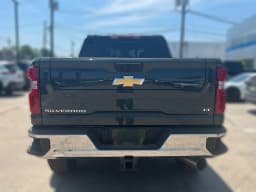 Chevrolet Silverado 2500HD LT 4WD Crew Cab 159" 2026 — side view