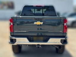 Chevrolet Silverado 2500HD LT 4WD Crew Cab 159" 2026 — side view