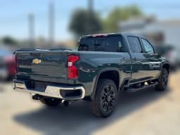 Chevrolet Silverado 2500HD LT 4WD Crew Cab 159" 2026 — side view