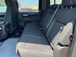 Chevrolet Silverado 2500HD LT 4WD Crew Cab 159" 2026 — side view