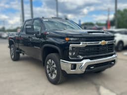 Chevrolet Silverado 2500HD LT 4WD Crew Cab 159" 2026 — side view