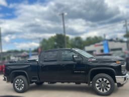 Chevrolet Silverado 2500HD LT 4WD Crew Cab 159" 2026 — side view