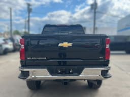 Chevrolet Silverado 2500HD LT 4WD Crew Cab 159" 2026 — side view