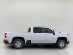 Chevrolet Silverado 2500HD LT 4WD Crew Cab 159" 2026 — side view