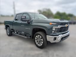 Chevrolet Silverado 2500HD LT 4WD Crew Cab 159" 2026 — side view