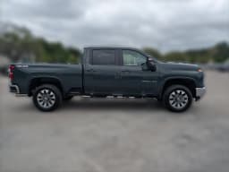 Chevrolet Silverado 2500HD LT 4WD Crew Cab 159" 2026 — side view