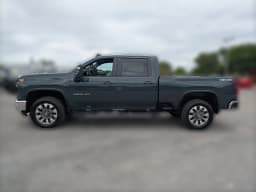 Chevrolet Silverado 2500HD LT 4WD Crew Cab 159" 2026 — side view