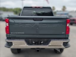Chevrolet Silverado 2500HD LT 4WD Crew Cab 159" 2026 — side view