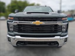 Chevrolet Silverado 2500HD LT 4WD Crew Cab 159" 2026 — side view