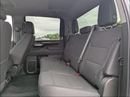 Chevrolet Silverado 2500HD LT 4WD Crew Cab 159" 2026 — side view