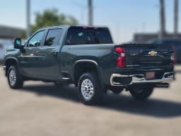 Chevrolet Silverado 2500HD LT 4WD Crew Cab 159" 2026 — side view