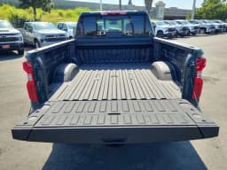 Chevrolet Silverado 2500HD LT 4WD Crew Cab 159" 2026 — side view