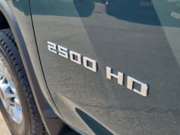 Chevrolet Silverado 2500HD LT 4WD Crew Cab 159" 2026 — side view