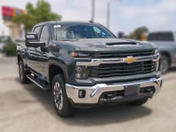 Chevrolet Silverado 2500HD LT 4WD Crew Cab 159" 2026 — side view