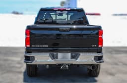 Chevrolet Silverado 2500HD LTZ 4WD Crew Cab 159" 2026 — side view