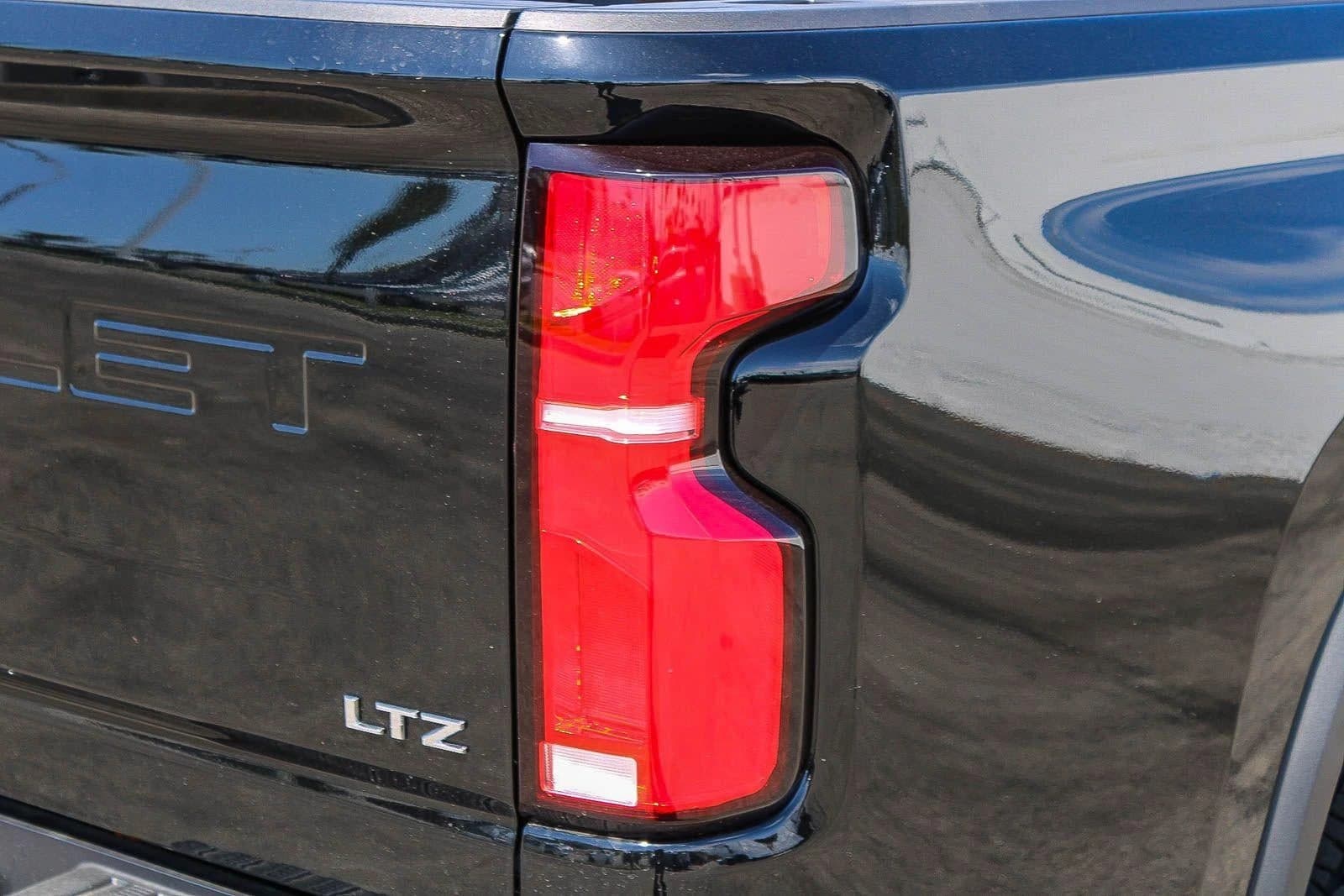 Chevrolet Silverado 2500HD LTZ 4WD Crew Cab 159" 2026 — side view