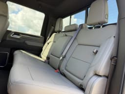 Chevrolet Silverado 2500HD LTZ 4WD Crew Cab 159" 2026 — side view