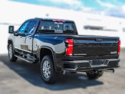 Chevrolet Silverado 2500HD High Country 4WD Crew Cab 159" 2026 — side view