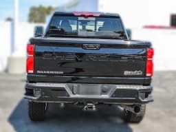 Chevrolet Silverado 2500HD High Country 4WD Crew Cab 159" 2026 — side view