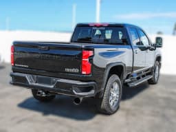 Chevrolet Silverado 2500HD High Country 4WD Crew Cab 159" 2026 — side view