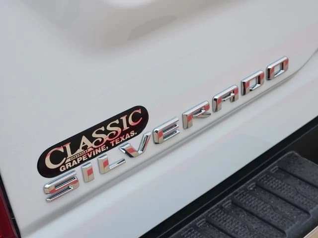 Chevrolet Silverado 3500HD Work Truck 4WD Crew Cab 159" 2026 — side view
