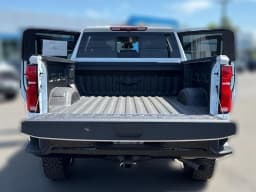 Chevrolet Silverado 3500HD LT 4WD Crew Cab 159" 2026 — side view