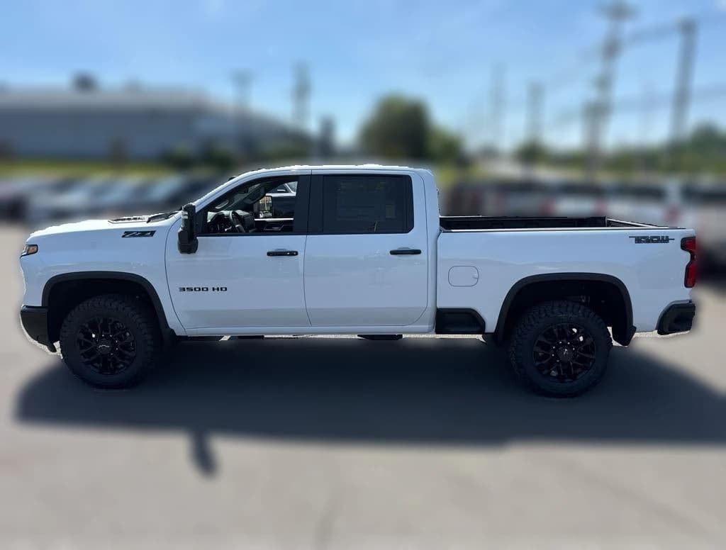 Chevrolet Silverado 3500HD LT 4WD Crew Cab 159" 2026 — side view