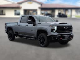 Chevrolet Silverado 3500HD LT 4WD Crew Cab 159" 2026 — side view