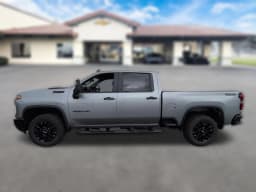 Chevrolet Silverado 3500HD LT 4WD Crew Cab 159" 2026 — side view