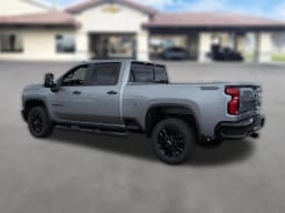 Chevrolet Silverado 3500HD LT 4WD Crew Cab 159" 2026 — side view