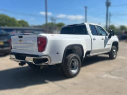 Chevrolet Silverado 3500HD LT 4WD Double Cab 162" 2026 — side view