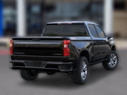 Chevrolet Silverado 1500 Custom 4WD Crew Cab 147" 2026 — side view