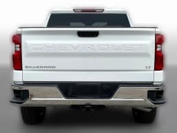 Chevrolet Silverado 1500 LT 4WD Crew Cab 147" 2026 — side view