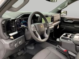 Chevrolet Silverado 1500 LT 4WD Crew Cab 147" 2026 — side view